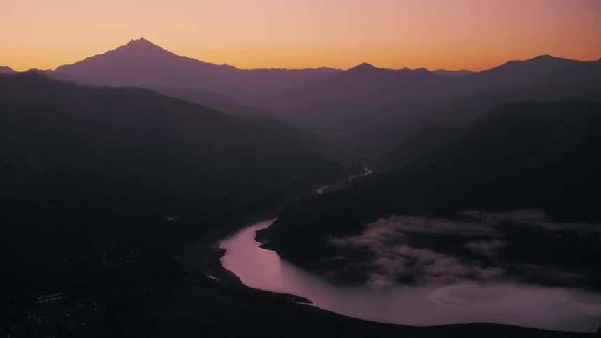 A river runs between some mountains