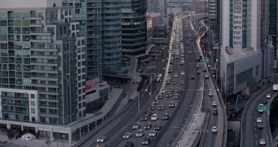 Vehicles commute on a city highway