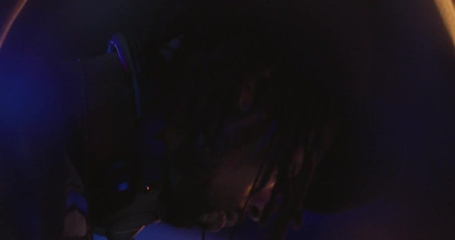 A dj is playing music at an event