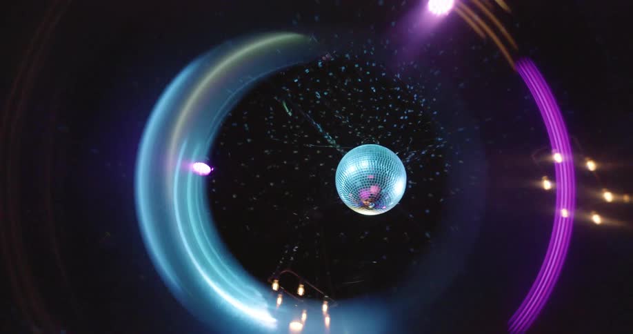 Light reflects all over the walls when it hits the disco ball