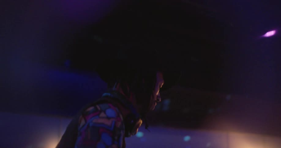 Dj performing at a nightclub