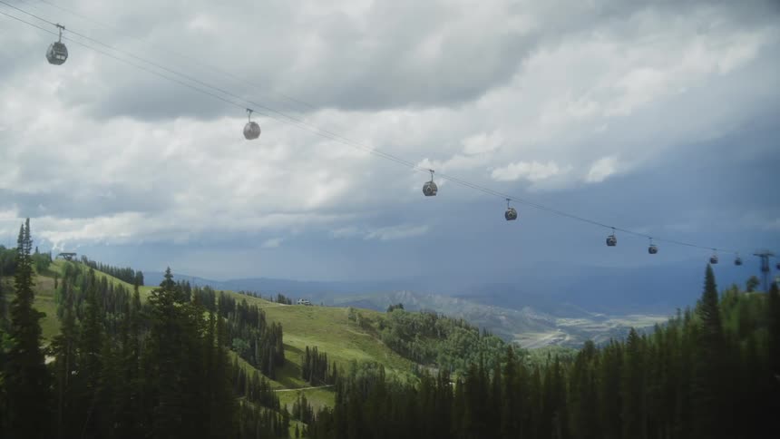 Mountainous landscape with several cable cars