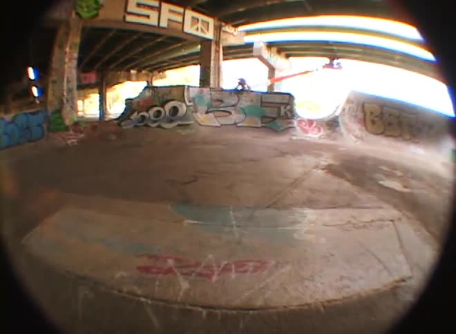 Boy doing tricks on a skate park