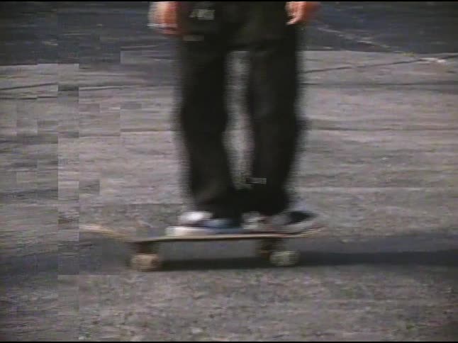Boy doing a trick with a skateboard