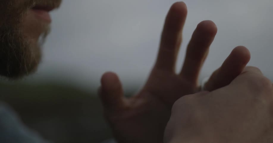 Man twists ring around his finger