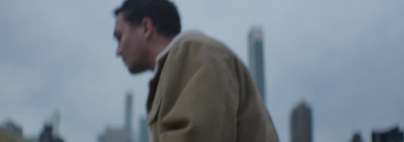 A clip of a person operating a phone while walking