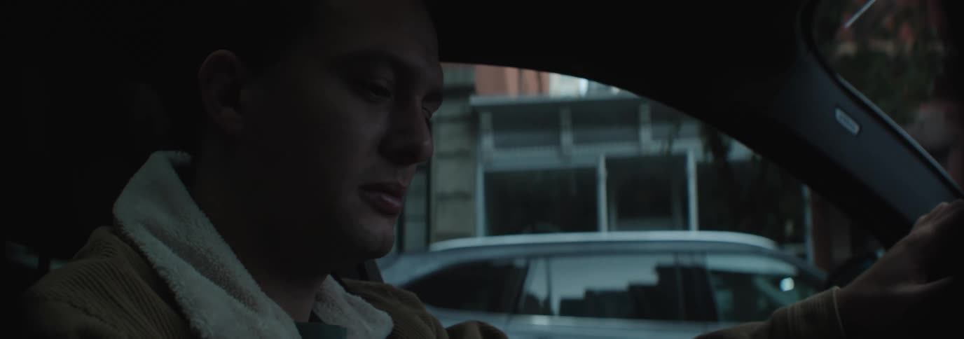 A clip of a person inside a private car