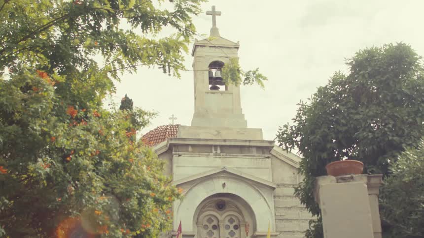 Past the iron gate is a church