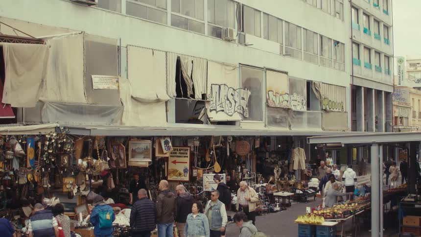 A clip of people buying from the market