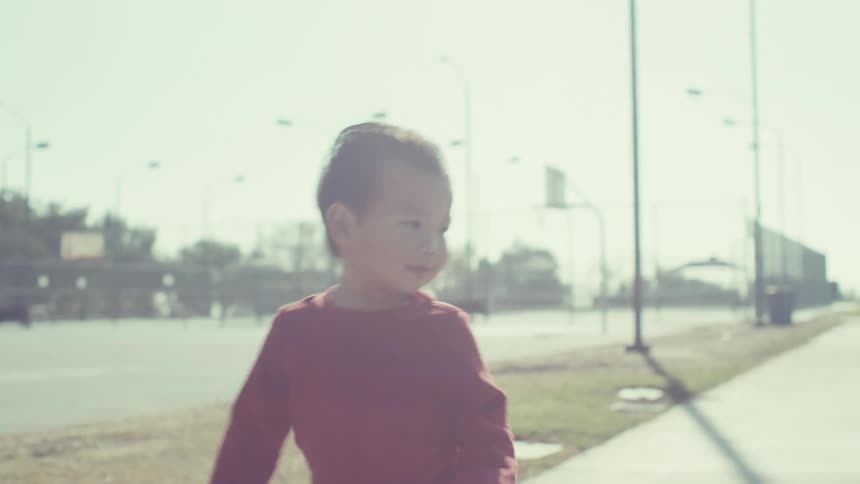 A mother and her child enjoying a sunny day at the park