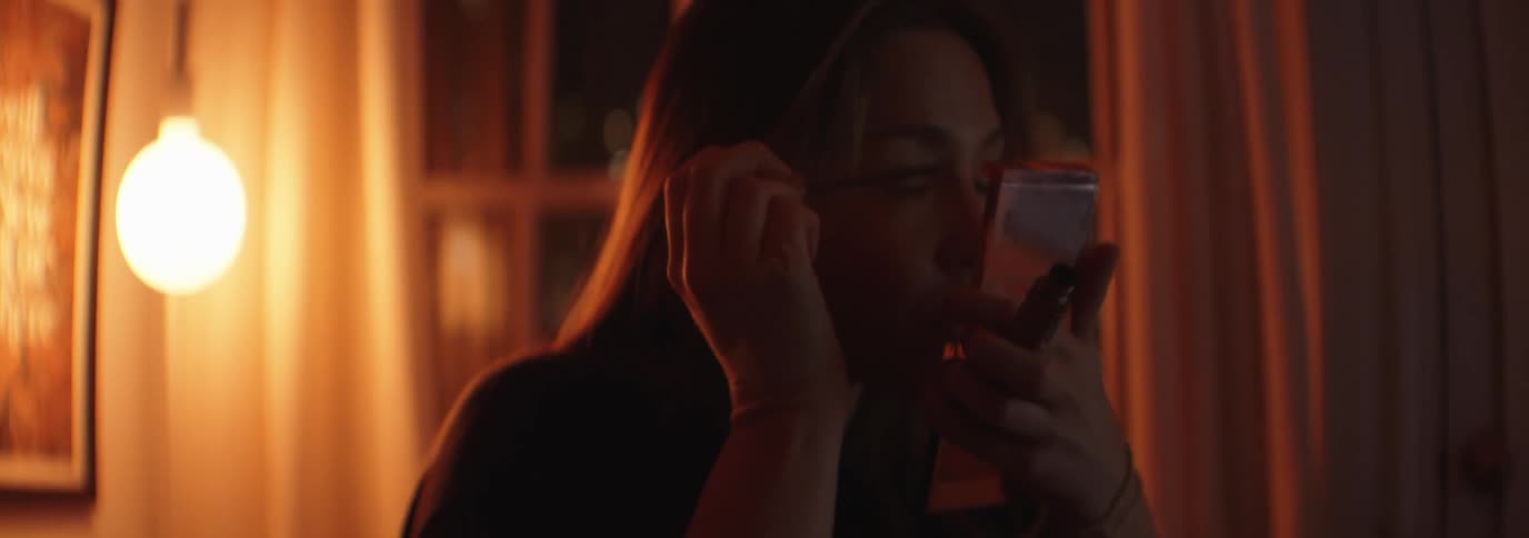 A clip of a lady making up