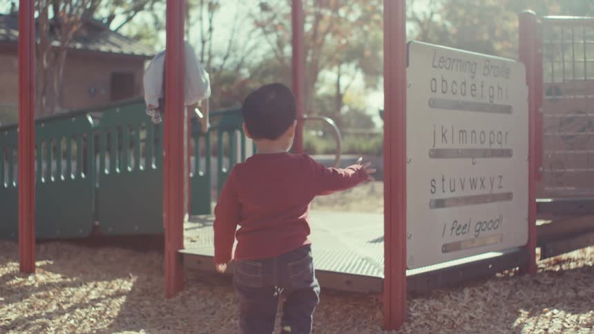 A child climbs into the playground