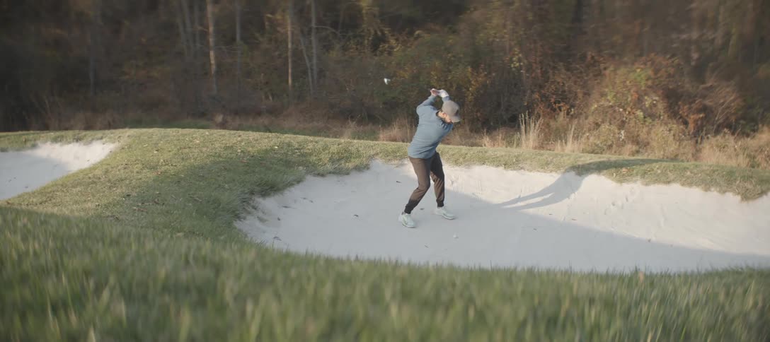 A clip of a man playing golf