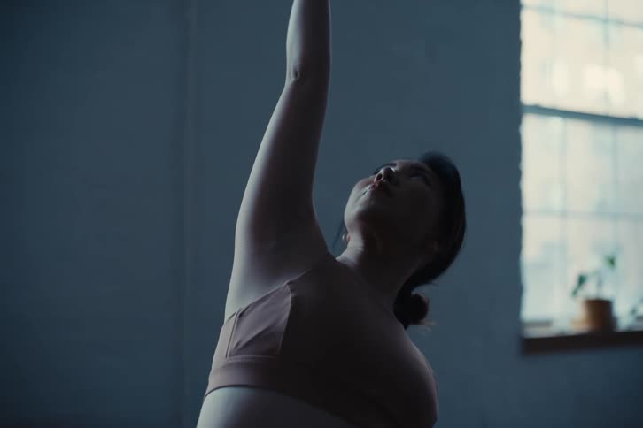 A clip of an asian woman stretching