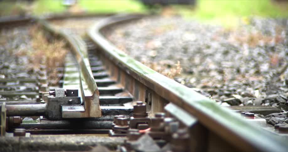 A train railroad switching tracks outdoors during daytime