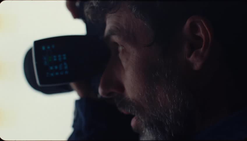 A man takes photos with a professional camera
