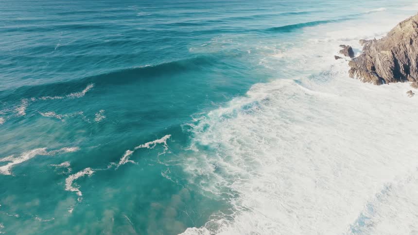 Waves wash up on the coast