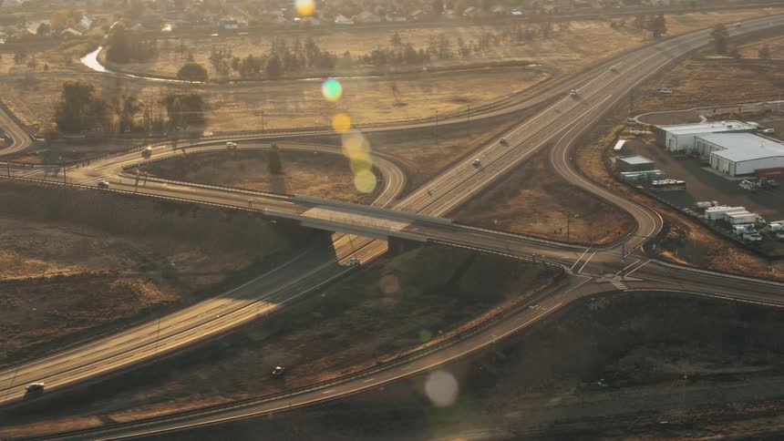 Multiple lanes connect on a highway