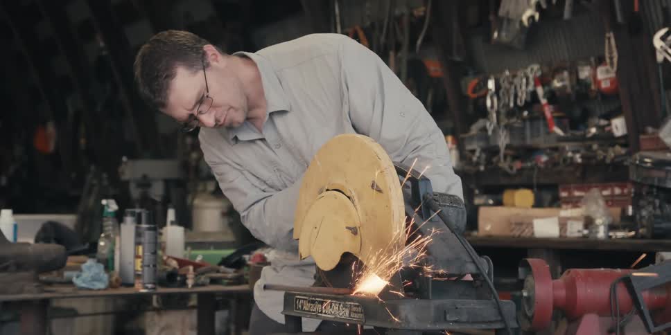 Man using a makita in a workshop