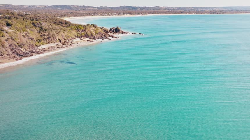 The ocean flows along a coast