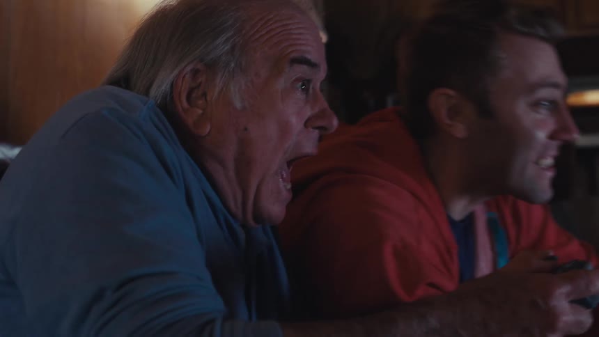 Two men are having fun playing video games