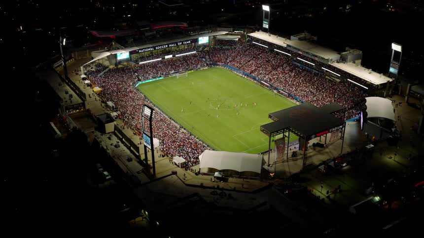 An aerial clip of a stadium filled with fans