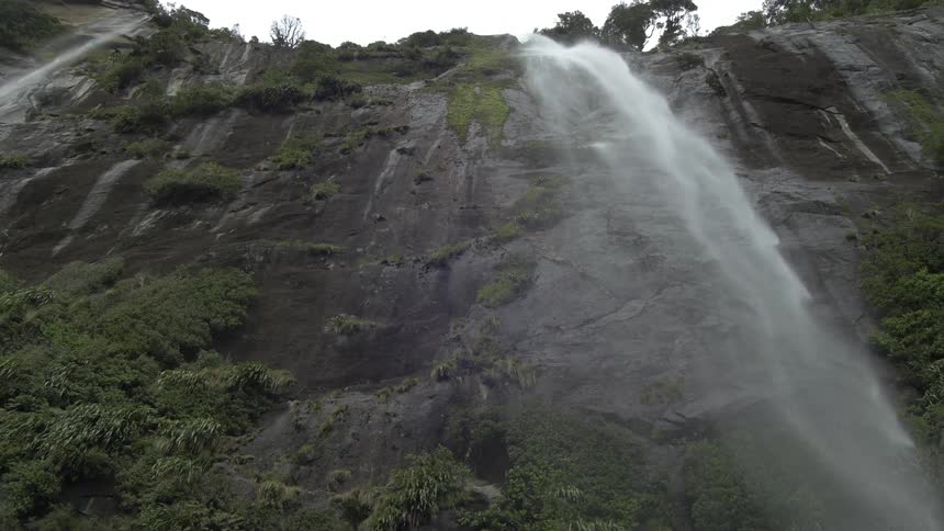 View looking up at a waterfall