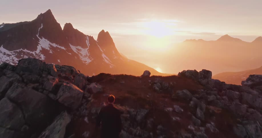 A man is hiking on the mountain