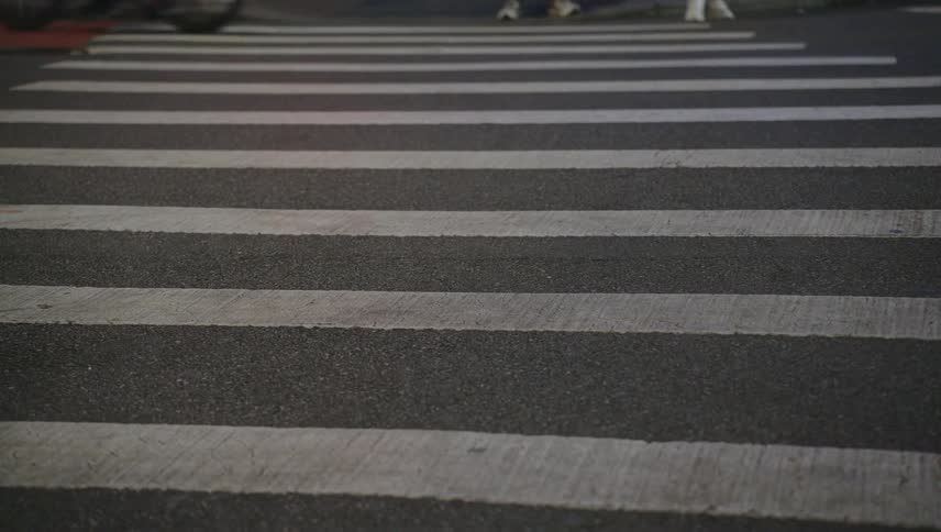 Vehicles move over crosswalk