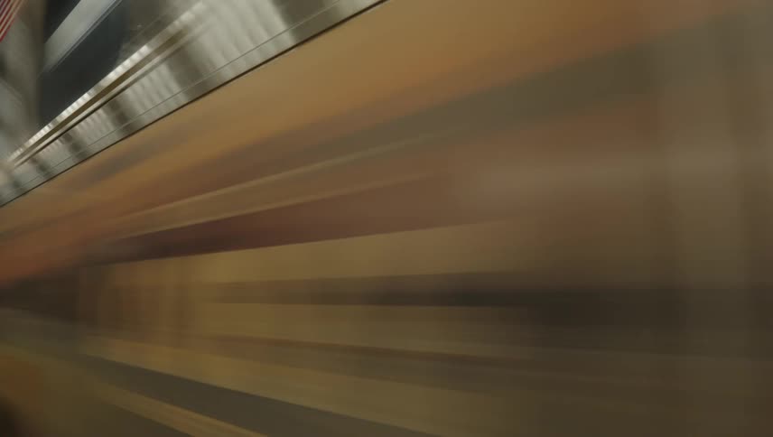 A train is passing by in the subway