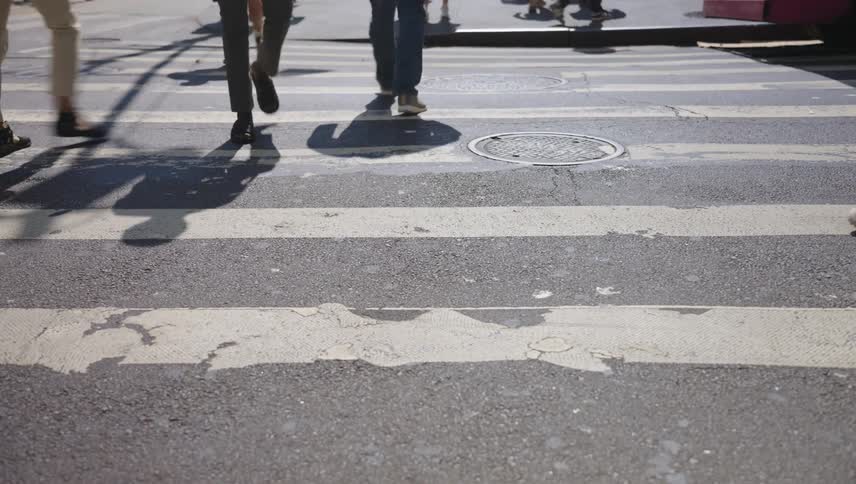 Pedestrians crossing a crosswalk
