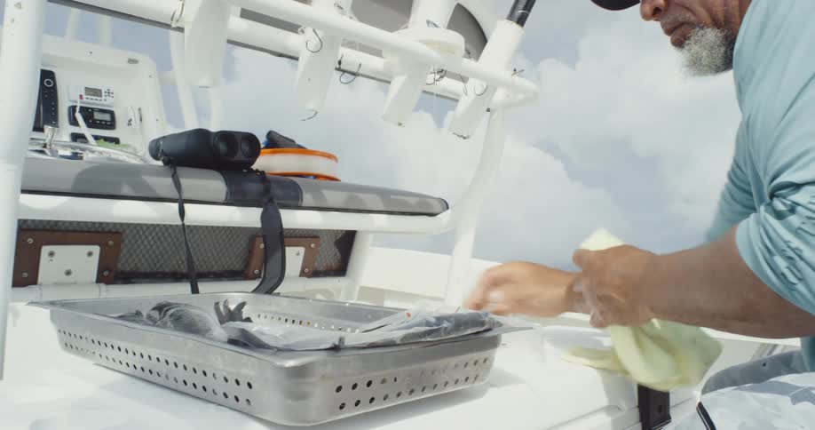 A clip of a person preparing a fish