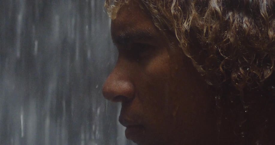 Water is pouring on the person