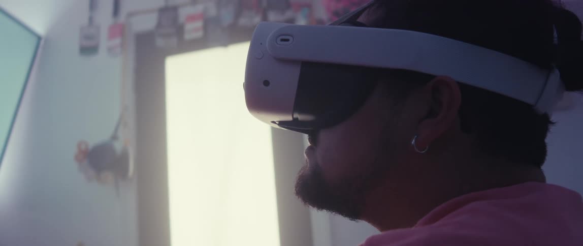 Man in a room using vr headset