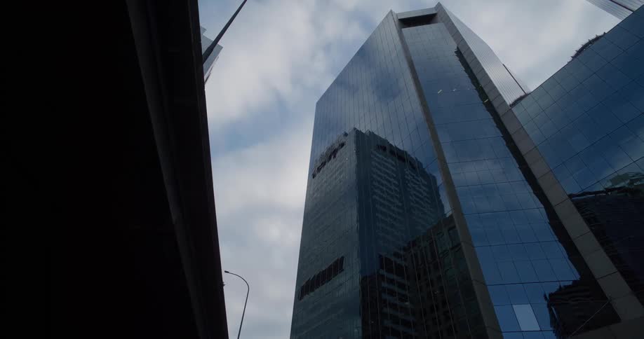 Tall buildings fill the city block
