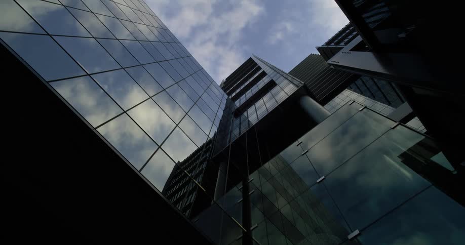The building is covered with reflective windows