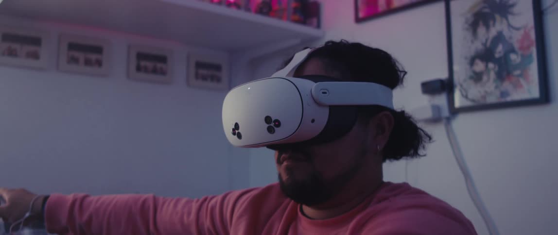 Man making arm movements while using vr headset