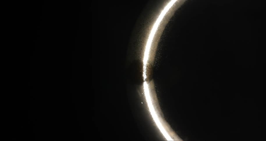Abstract bright circular ring against a dark background