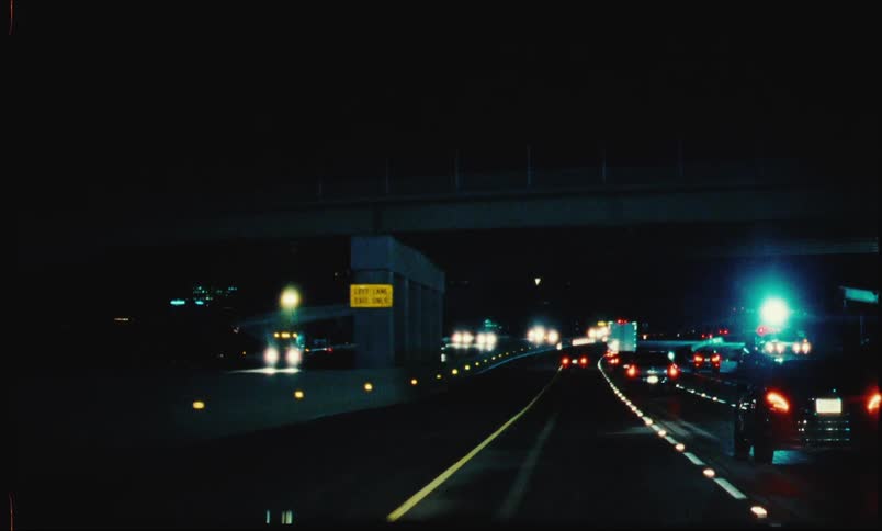 Vehicle traffic on a highway at night