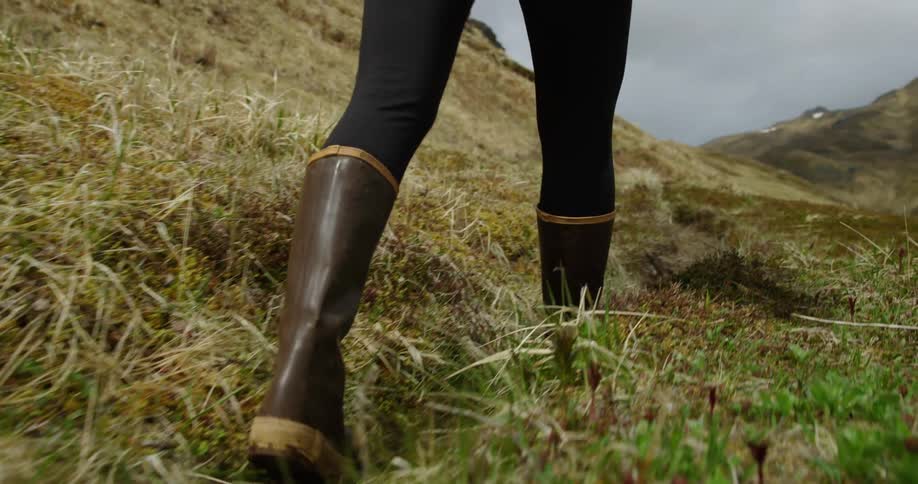 A person is hiking over the hills
