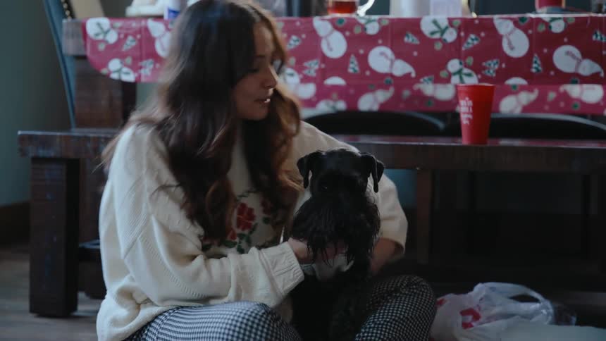 Girl hugging a dog affectionately