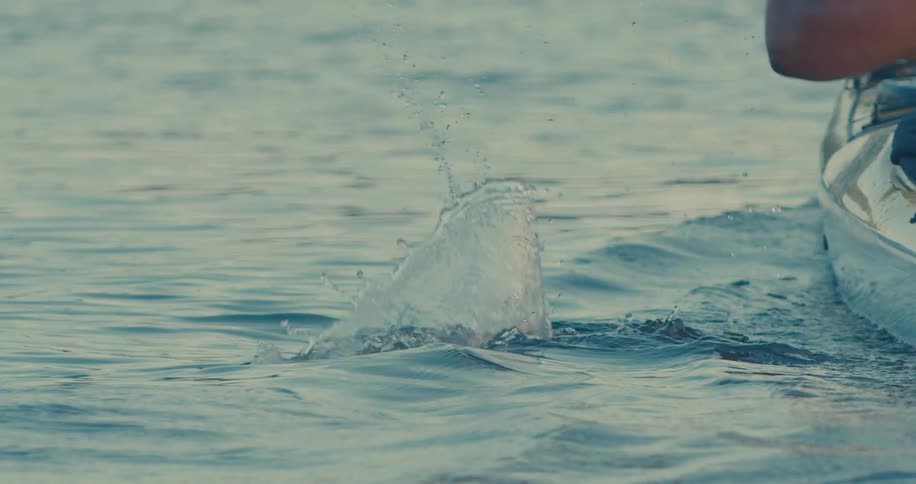 Person paddling canoeing