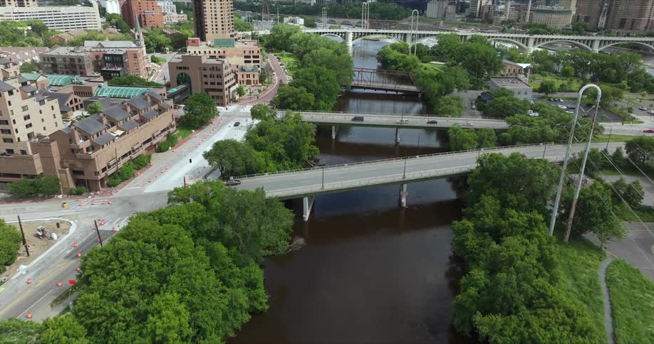 Aerial view of highways above a sea channel in a metropolis