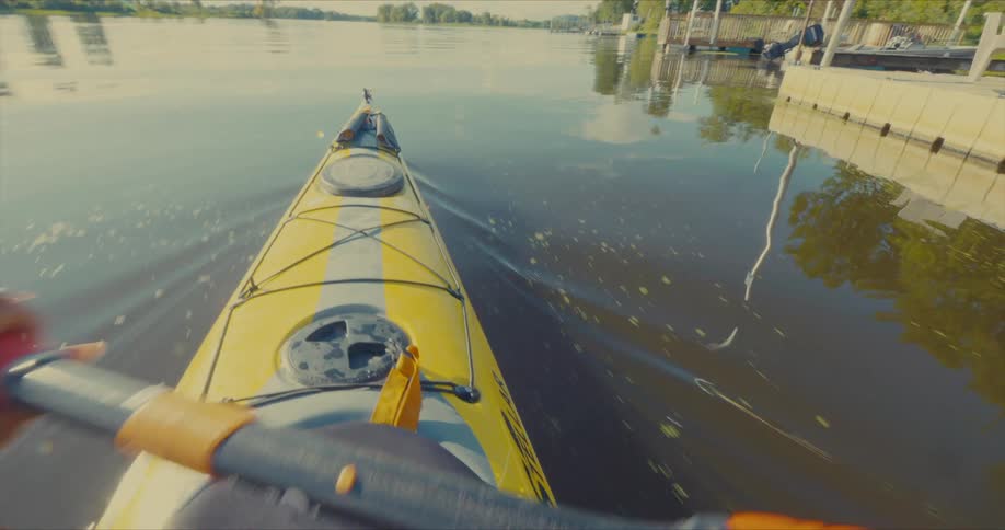 Point of view of a person canoeing