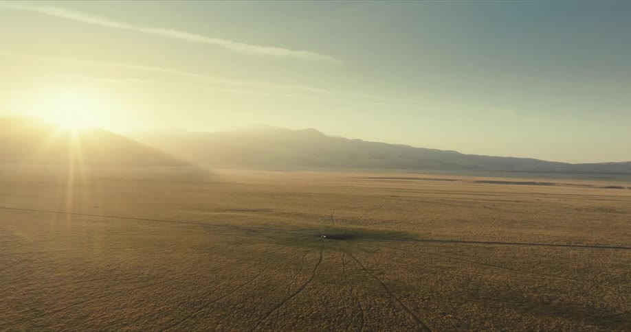 The is rising on the long green field