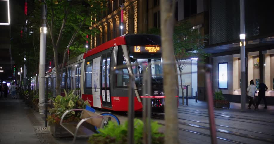 A clip of a public transport moving along the street
