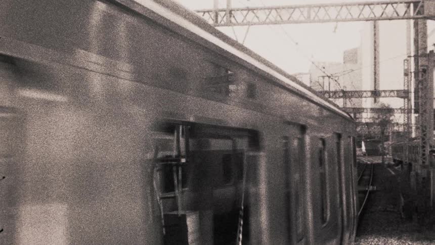Bullet train going back and forth through a city