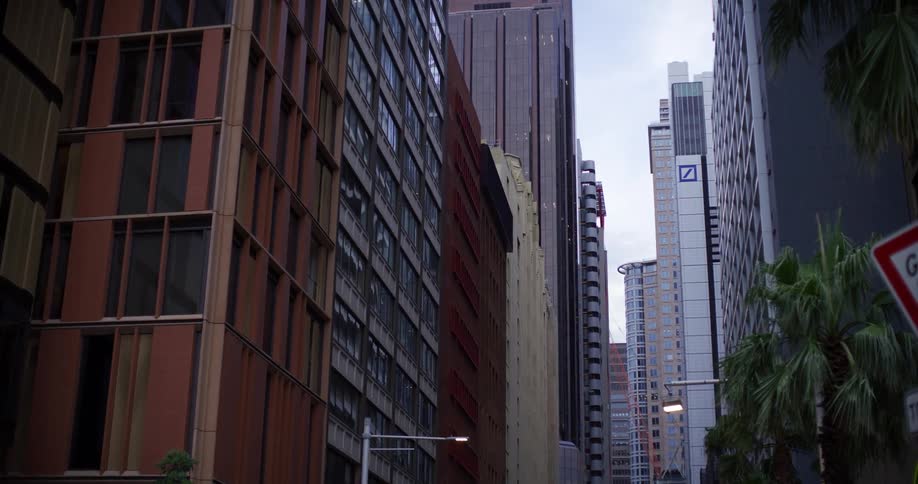 Urban road and a metropolis surrounded by modern buildings