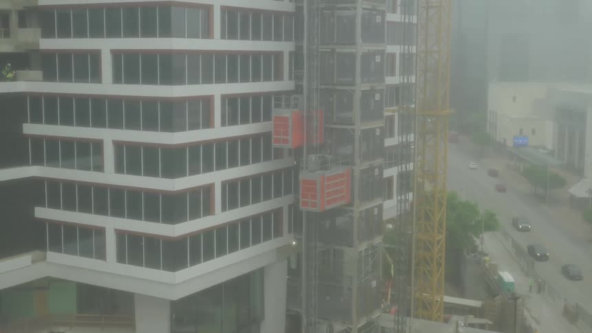 A close up clip of a high rise building in the city