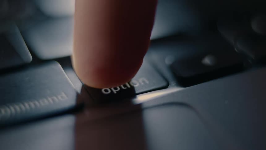 A close up clip of a person typing